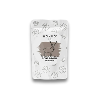Hokuō bone broth med smak av hjort og reishi i hvit pose